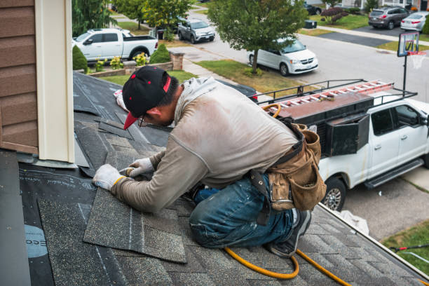 Professional Flat Roof Repair technician working in Franklin, MA